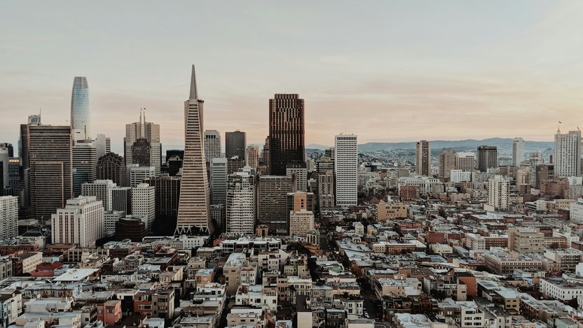 The San Francisco skyline at dusk, looking across downtown towards the bay